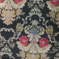 Tessuto broccato jacquard a fiori neri per abito